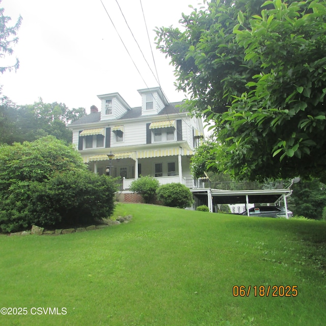 324 Tulip Rd, Paxinos, PA 17860 - rear view of house featuring a yard