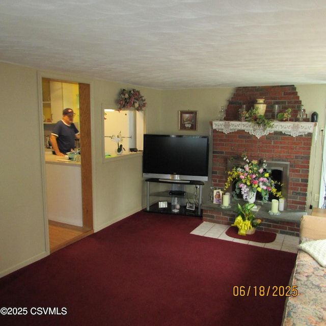 324 Tulip Rd, Paxinos, PA 17860 - carpeted living room with a brick fireplace and baseboards