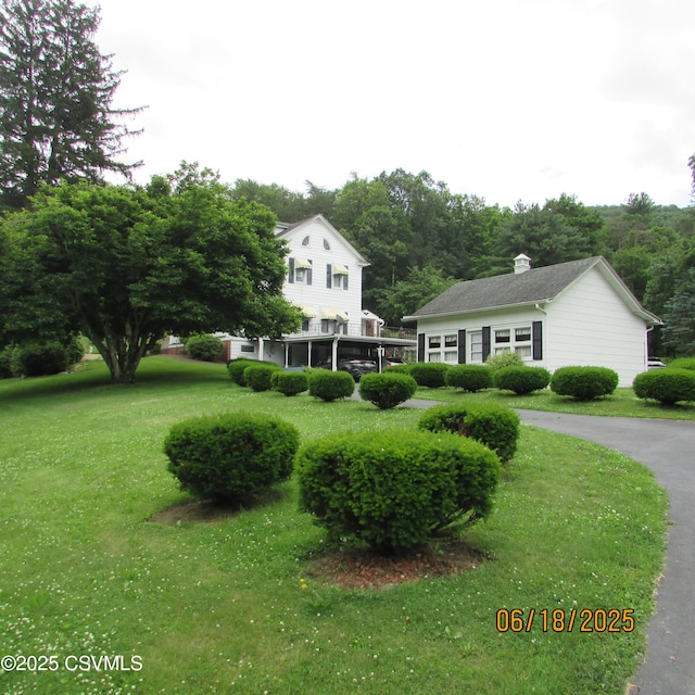 324 Tulip Rd, Paxinos, PA 17860 - view of front of house featuring a front yard and a chimney