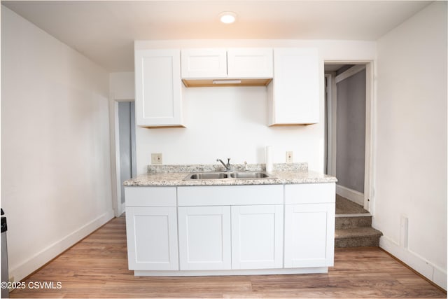 126-128 Murray Ave, Bloomsburg, PA 17815 - kitchen with white cabinetry and light wood finished floors