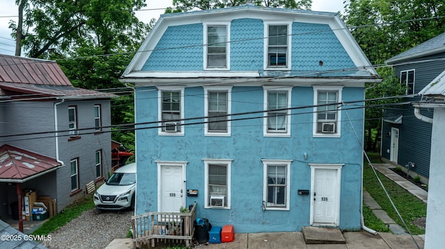 126-128 Murray Ave, Bloomsburg, PA 17815 - view of front of house with stucco siding and cooling unit