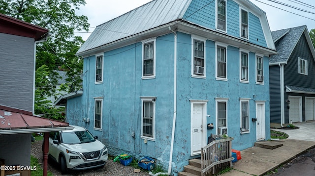 126-128 Murray Ave, Bloomsburg, PA 17815 - view of property exterior with stucco siding and driveway