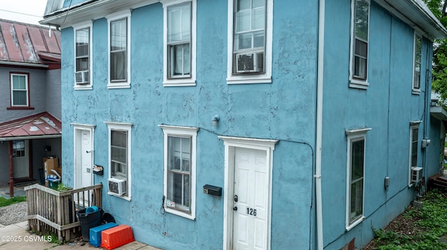 126-128 Murray Ave, Bloomsburg, PA 17815 - view of front of house featuring stucco siding and cooling unit