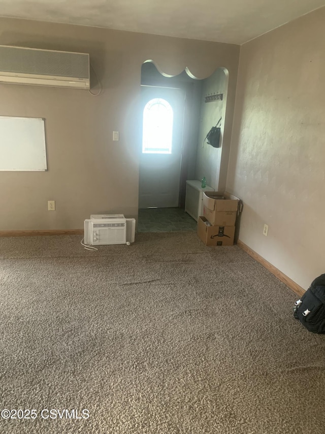 1542 1st Ave, Berwick, PA 18603 - carpeted empty room featuring a wall mounted air conditioner and a wall unit AC