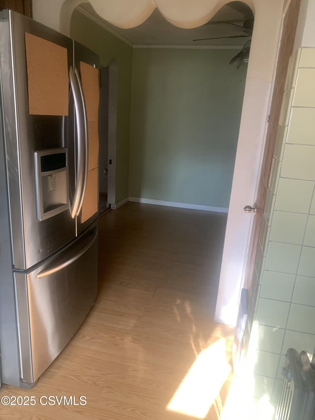 1542 1st Ave, Berwick, PA 18603 - kitchen with stainless steel fridge, light wood-style floors, and ornamental molding