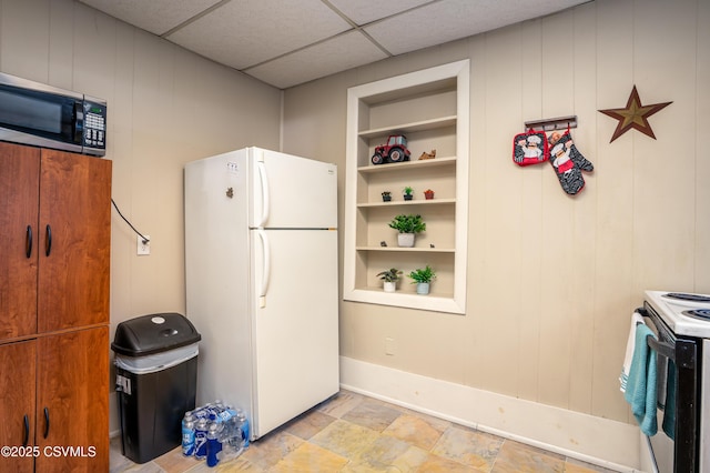 846-848 Orange St, Berwick, PA 18603 - kitchen featuring white appliances and a decorative wall