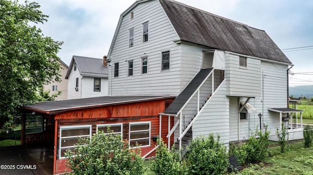 846-848 Orange St, Berwick, PA 18603 - back of property with a shingled roof