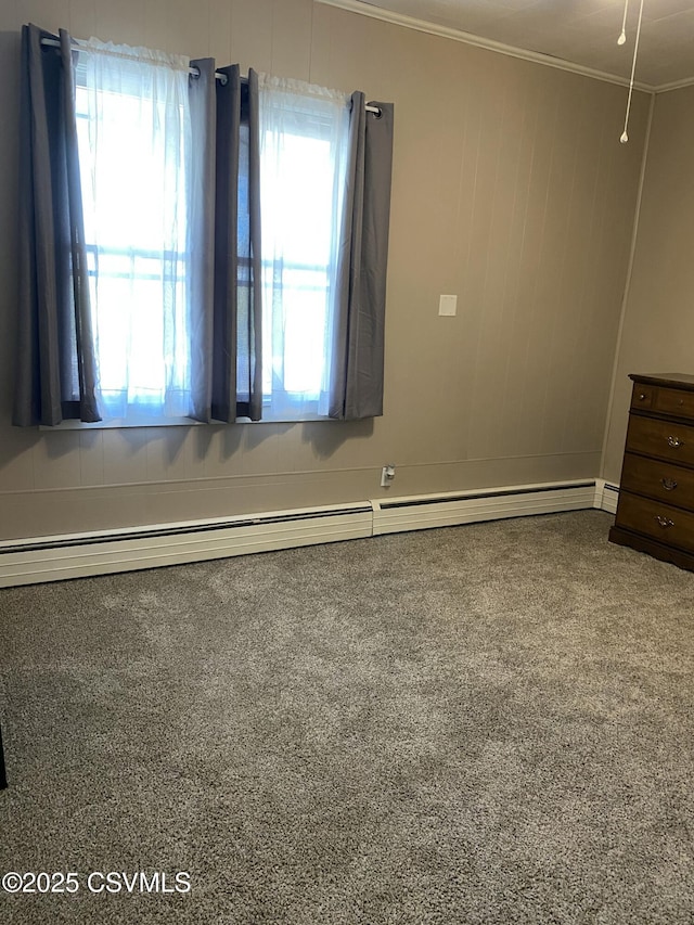 846-848 Orange St, Berwick, PA 18603 - empty room with ornamental molding, a baseboard heating unit, and carpet floors