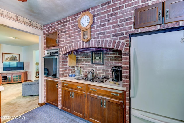 39 Mckendree Rd, Shickshinny, PA 18655 - kitchen featuring black appliances, carpet, light countertops, and open floor plan