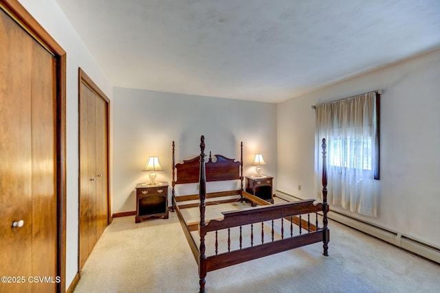 39 Mckendree Rd, Shickshinny, PA 18655 - carpeted bedroom featuring a baseboard radiator and two closets