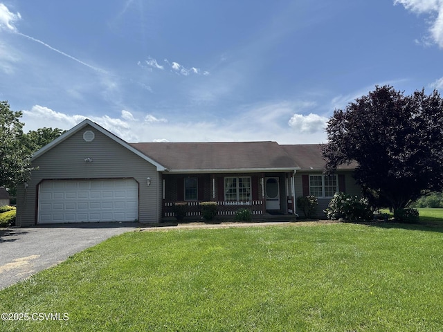 2133 Spruce Rd, Sunbury, PA 17801 - ranch-style home with a porch, a garage, a front yard, and asphalt driveway