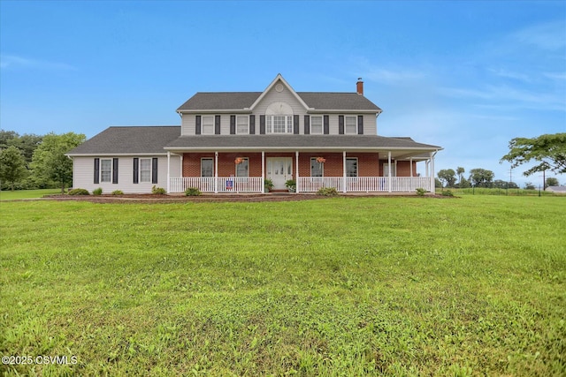 110 Buckeye Ln, New Columbia, PA 17856 - colonial home with a porch, a chimney, and a front lawn
