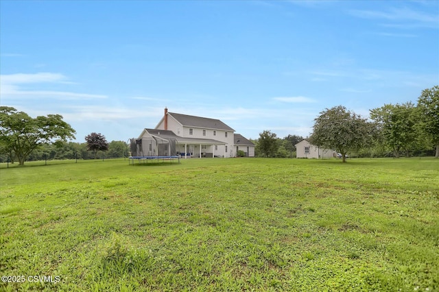 110 Buckeye Ln, New Columbia, PA 17856 - view of grassy yard featuring a trampoline
