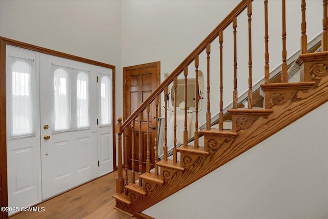 110 Buckeye Ln, New Columbia, PA 17856 - entrance foyer featuring a high ceiling, stairs, and wood finished floors