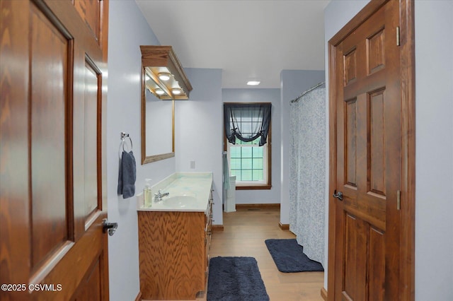 110 Buckeye Ln, New Columbia, PA 17856 - bathroom featuring vanity and wood finished floors