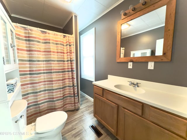 333 E Bowman St, Berwick, PA 18603 - full bathroom featuring crown molding, wood finished floors, vanity, and a shower with curtain