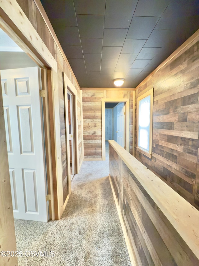 333 E Bowman St, Berwick, PA 18603 - corridor featuring wooden walls and carpet floors