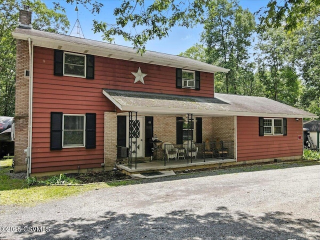 1146 Great Oak Dr, East Stroudsburg, PA 18301 - view of front of home with covered porch and a chimney