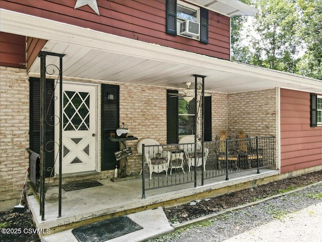 1146 Great Oak Dr, East Stroudsburg, PA 18301 - property entrance featuring a porch, cooling unit, and brick siding