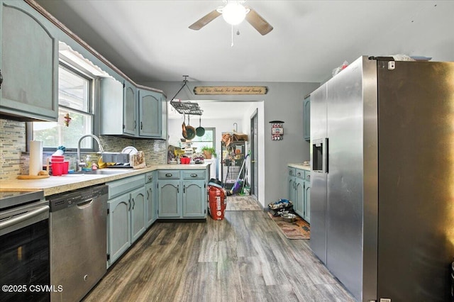 1146 Great Oak Dr, East Stroudsburg, PA 18301 - kitchen with stainless steel appliances, dark wood finished floors, ceiling fan, and light countertops