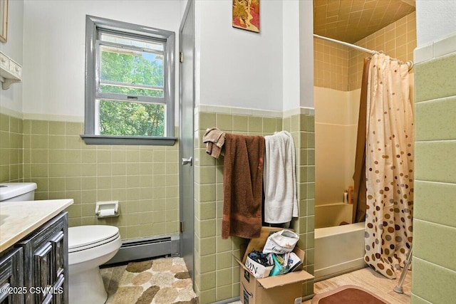 1146 Great Oak Dr, East Stroudsburg, PA 18301 - full bath with tile walls, a baseboard heating unit, vanity, shower / bathtub combination with curtain, and wainscoting