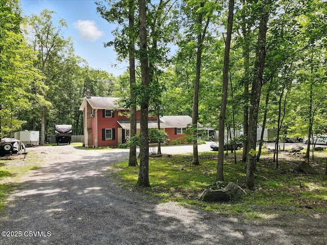 1146 Great Oak Dr, East Stroudsburg, PA 18301 - view of front of home with driveway and a chimney
