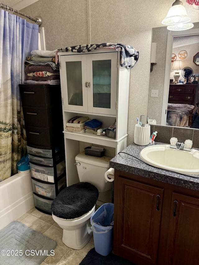 57 Buckhorn Rd, Bloomsburg, PA 17815 - full bath featuring vanity, tile patterned floors, a textured wall, and shower / tub combo with curtain