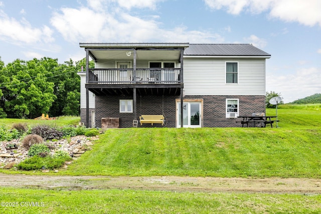 190 Foggy Mountain Rd, Turbotville, PA 17772 - rear view of property featuring brick siding, a lawn, and a metal roof
