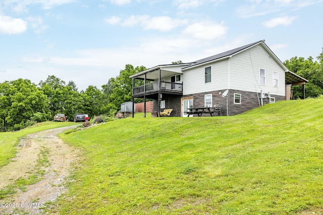 190 Foggy Mountain Rd, Turbotville, PA 17772 - rear view of house with driveway and a lawn