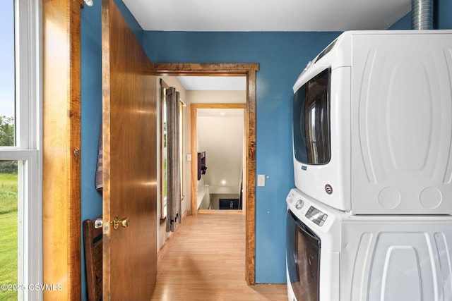 190 Foggy Mountain Rd, Turbotville, PA 17772 - washroom with stacked washer / drying machine and wood finished floors