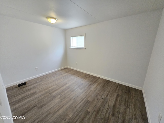 1824 Smalsh Barrick Rd, Middleburg, PA 17842 - empty room featuring dark wood-style flooring and baseboards