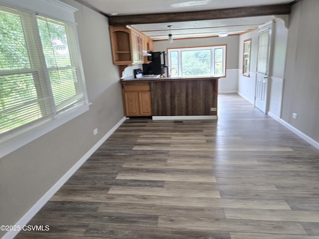 1824 Smalsh Barrick Rd, Middleburg, PA 17842 - kitchen with a peninsula, dark wood-style flooring, freestanding refrigerator, beam ceiling, and brown cabinets