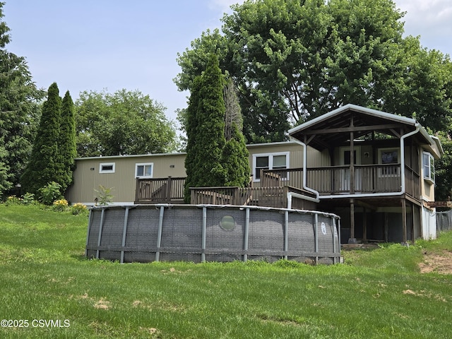 1824 Smalsh Barrick Rd, Middleburg, PA 17842 - rear view of house with a lawn and a deck