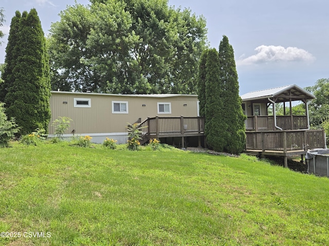 1824 Smalsh Barrick Rd, Middleburg, PA 17842 - rear view of house with a lawn and a wooden deck