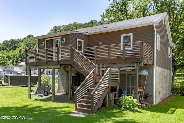 378 Drinker St, Bloomsburg, PA 17815 - rear view of property featuring a deck, a yard, stairway, and a shingled roof