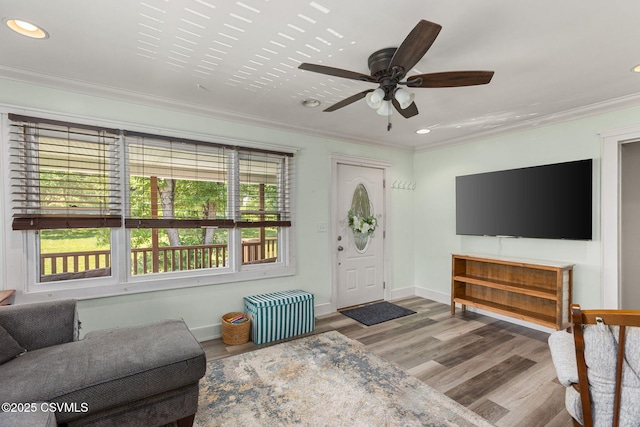 378 Drinker St, Bloomsburg, PA 17815 - living area with ornamental molding, wood finished floors, recessed lighting, a ceiling fan, and radiator heating unit