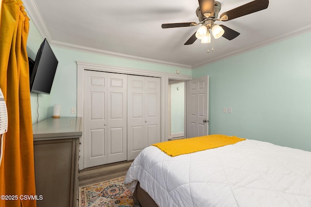 378 Drinker St, Bloomsburg, PA 17815 - bedroom featuring ornamental molding, wood finished floors, a closet, and a ceiling fan
