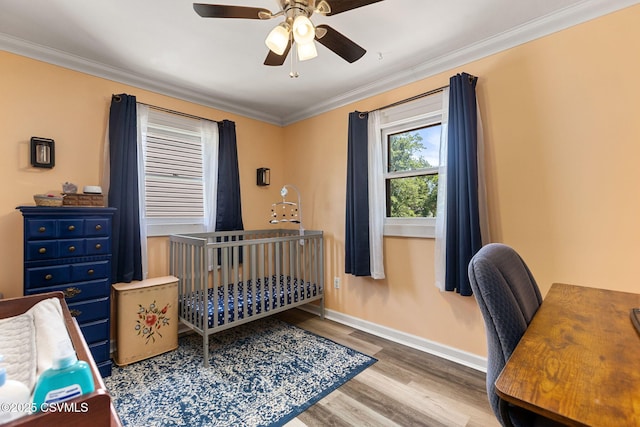 378 Drinker St, Bloomsburg, PA 17815 - bedroom featuring ornamental molding, wood finished floors, ceiling fan, and an office area