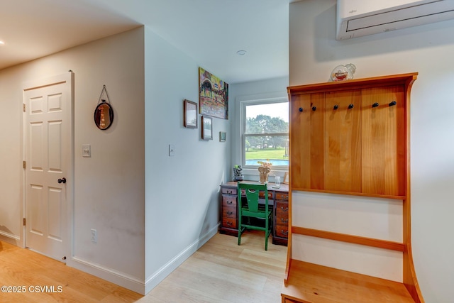 909 Fair St, Nescopeck, PA 18635 - stairs featuring an AC wall unit and wood finished floors