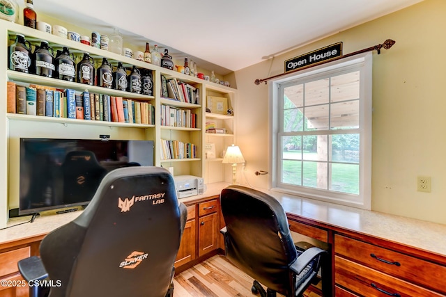 909 Fair St, Nescopeck, PA 18635 - home office featuring light wood-type flooring and built in study area