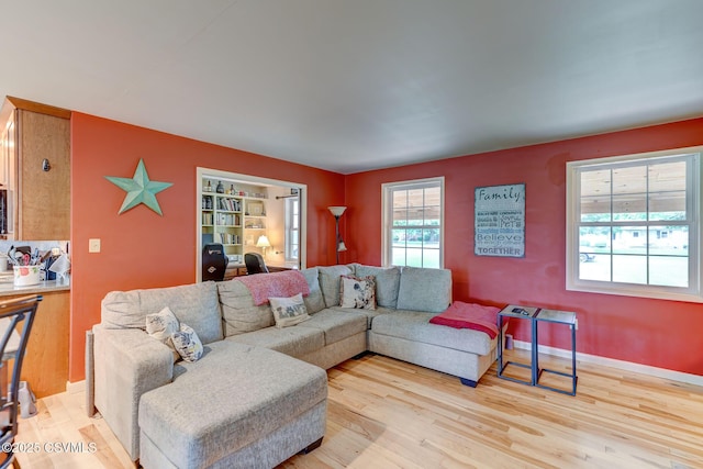 909 Fair St, Nescopeck, PA 18635 - living area featuring light wood-style floors and baseboards
