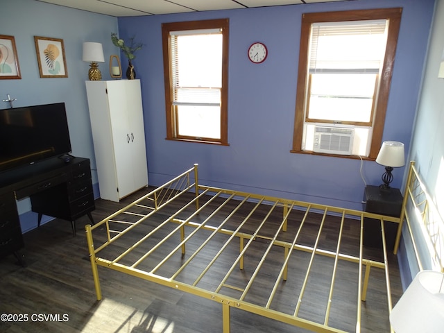 4 N Rock St, Shamokin, PA 17872 - unfurnished bedroom with cooling unit, multiple windows, and wood finished floors