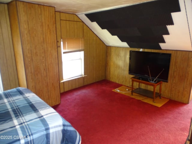 4 N Rock St, Shamokin, PA 17872 - bedroom featuring dark carpet, wooden walls, and vaulted ceiling