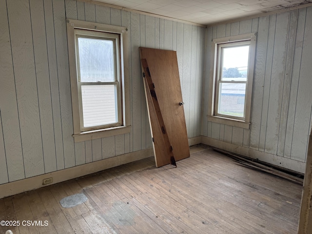 615 Broad St, Berwick, PA 18603 - unfurnished room with wood-type flooring and wood walls