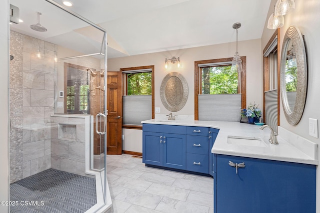68 March Cir, Winfield, PA 17889 - bathroom featuring healthy amount of natural light, a stall shower, and two vanities