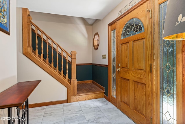 68 March Cir, Winfield, PA 17889 - entryway with marble look tile flooring and stairway