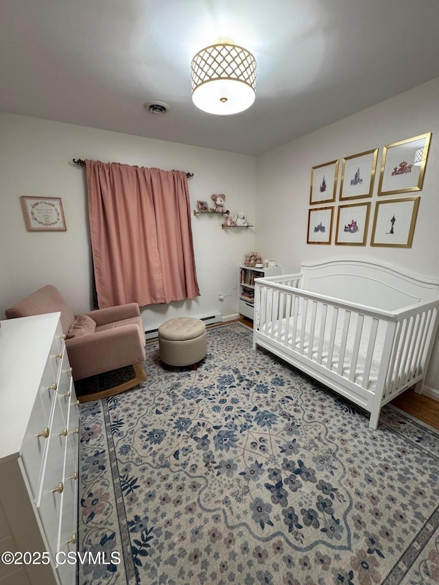 150 Blue Spruce Ln, Shamokin, PA 17872 - bedroom with a crib and baseboard heating