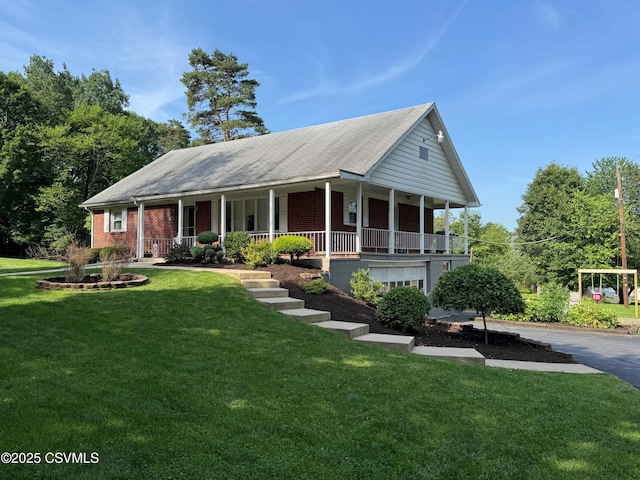 150 Blue Spruce Ln, Shamokin, PA 17872 - view of front facade with covered porch, a front lawn, and brick siding