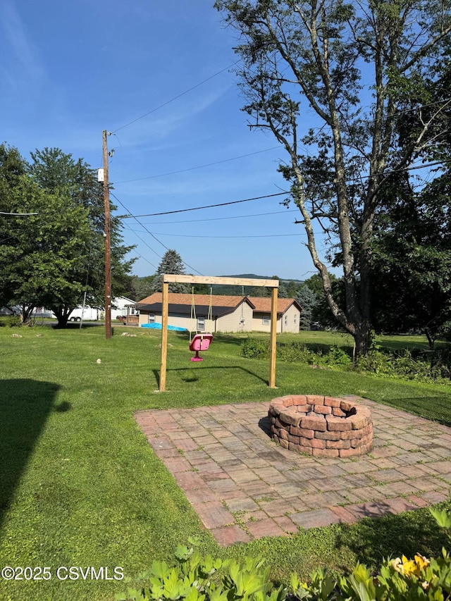 150 Blue Spruce Ln, Shamokin, PA 17872 - view of grassy yard with an outdoor fire pit