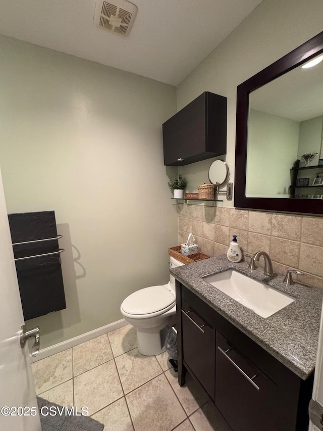 150 Blue Spruce Ln, Shamokin, PA 17872 - half bathroom featuring vanity, tile patterned flooring, and decorative backsplash
